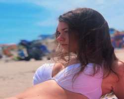 She loves to spend time on the beach.